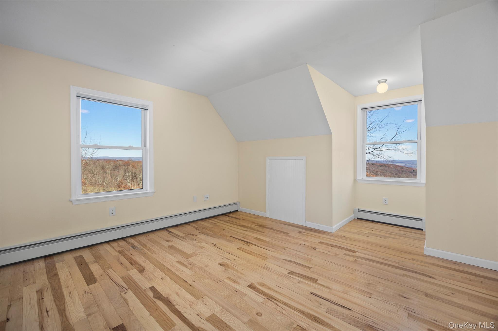 641 Smithfield Road Millerton, NY 12546 - Photo 16 of 20 a view of an empty room with wooden floor and a window