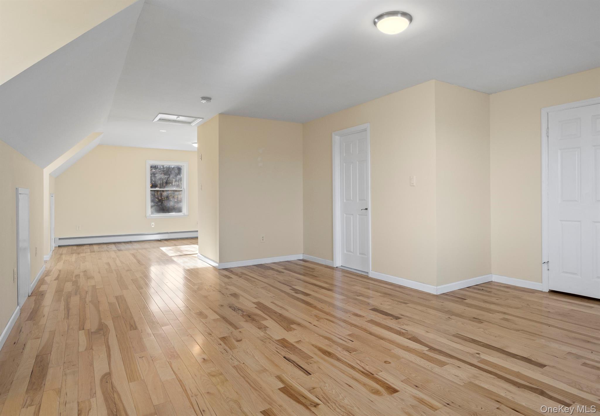 641 Smithfield Road Millerton, NY 12546 - Photo 17 of 20 a view of empty room with wooden floor