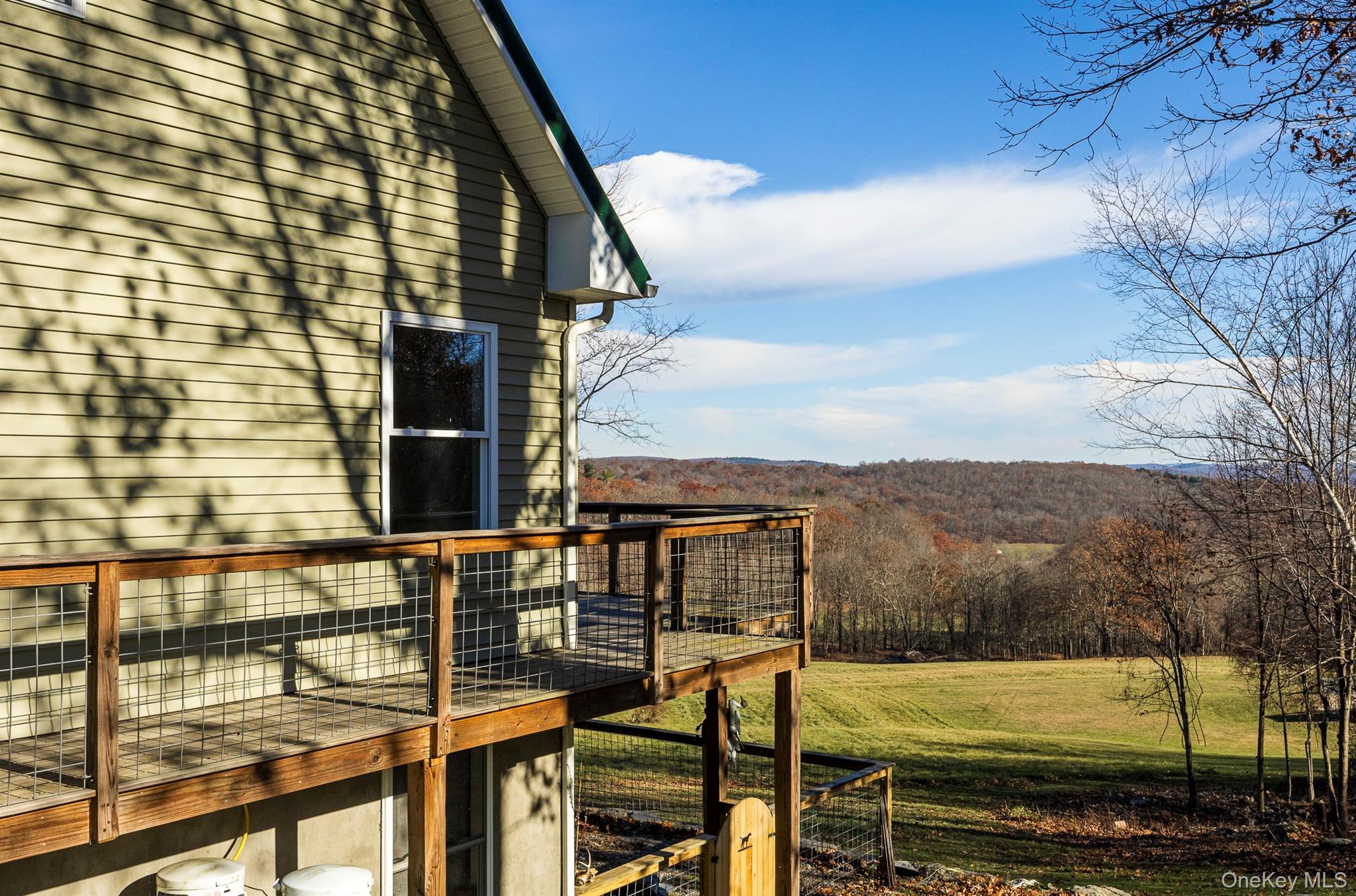 641 Smithfield Road Millerton, NY 12546 - Photo 9 of 22 a view of a balcony with two chairs