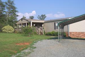 1336 Rockcreek Road Sandy Level, VA 24161 - Photo 2 of 19 a front view of a house with garden