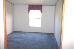 1336 Rockcreek Road Sandy Level, VA 24161 - Photo 17 of 19 a view of an empty room and a window