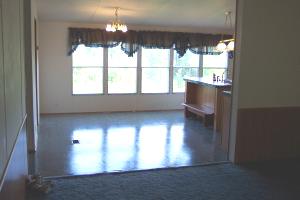 1336 Rockcreek Road Sandy Level, VA 24161 - Photo 18 of 19 an empty room with wooden floor and windows