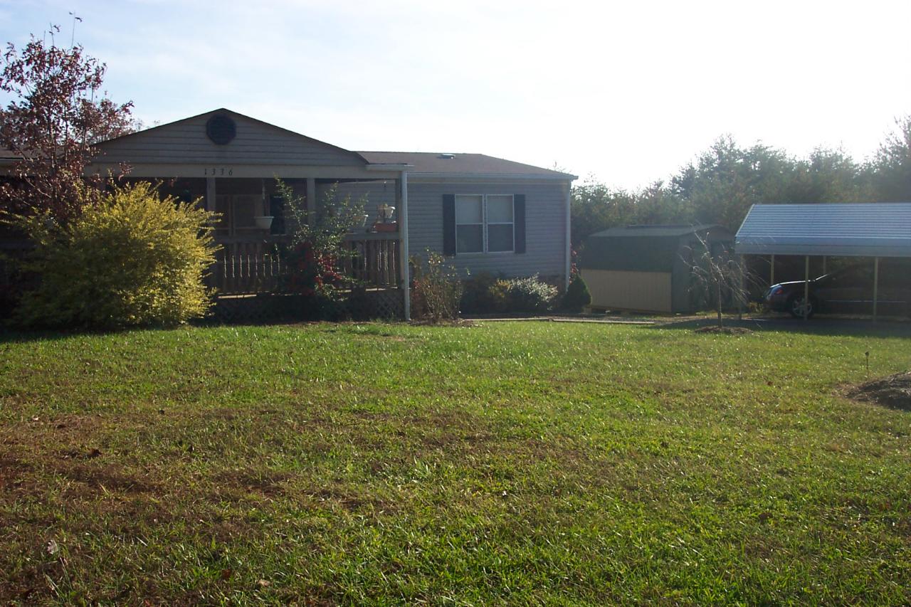 1336 Rockcreek Road Sandy Level, VA 24161 - Photo 4 of 19 a front view of house with yard and trees