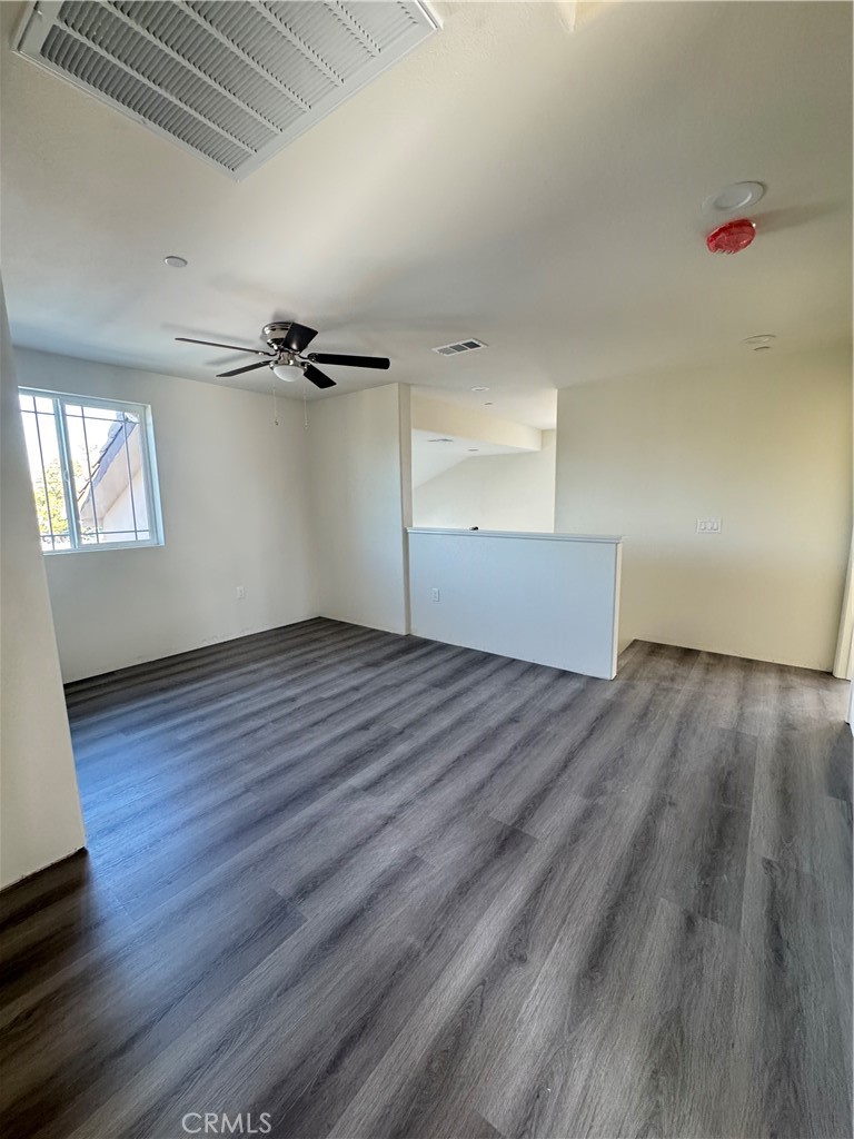 191 East O Street Colton, CA 92324 - Photo 23 of 27 wooden floor in an empty room