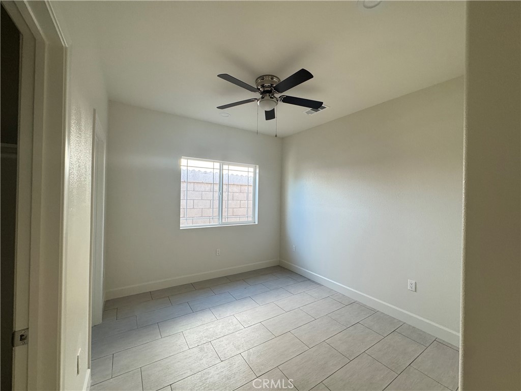 191 East O Street Colton, CA 92324 - Photo 4 of 27 a view of an empty room with a window