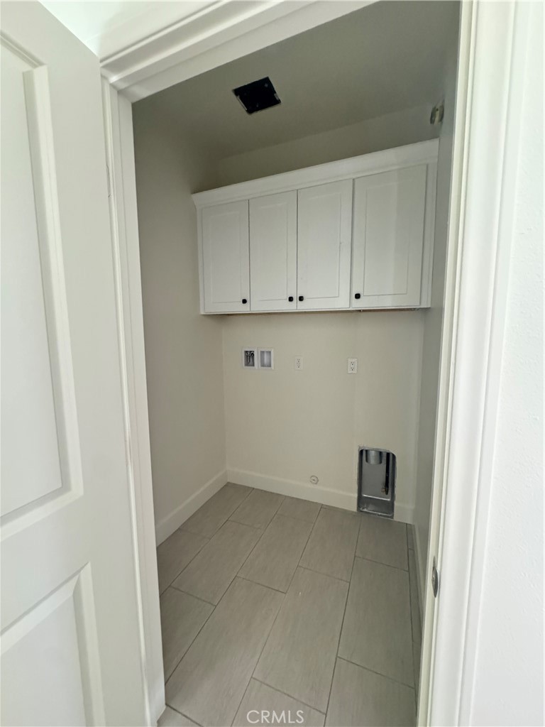 191 East O Street Colton, CA 92324 - Photo 5 of 27 a view of kitchen with white cabinets