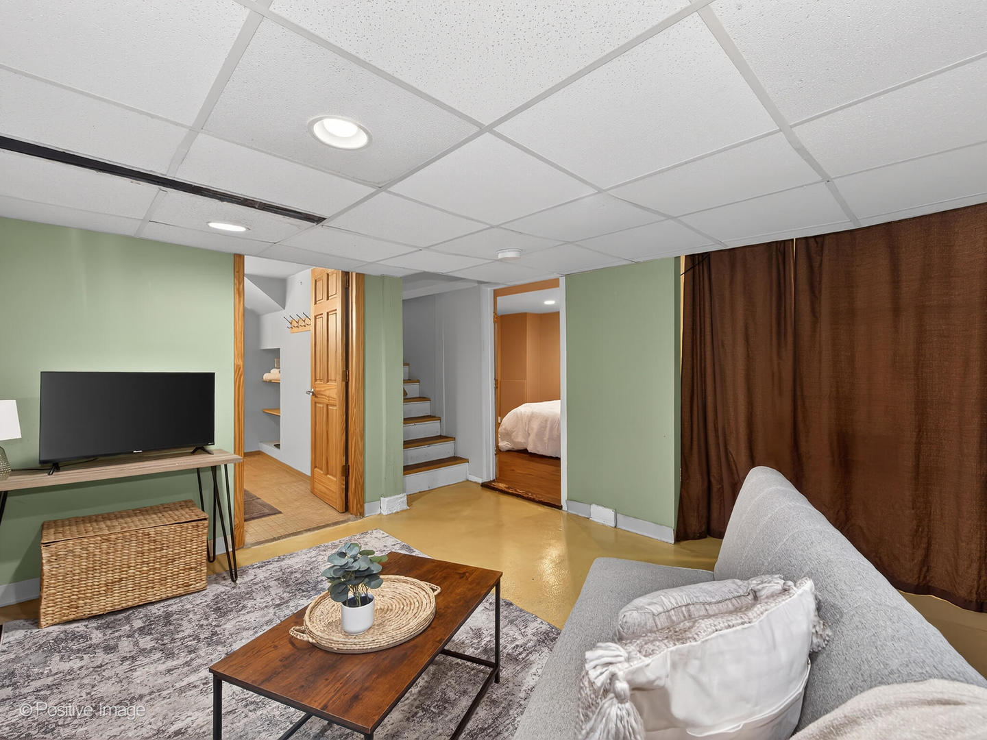 4214 Prairie Avenue Brookfield, IL 60513 - Photo 14 of 19 a living room with furniture and a flat screen tv