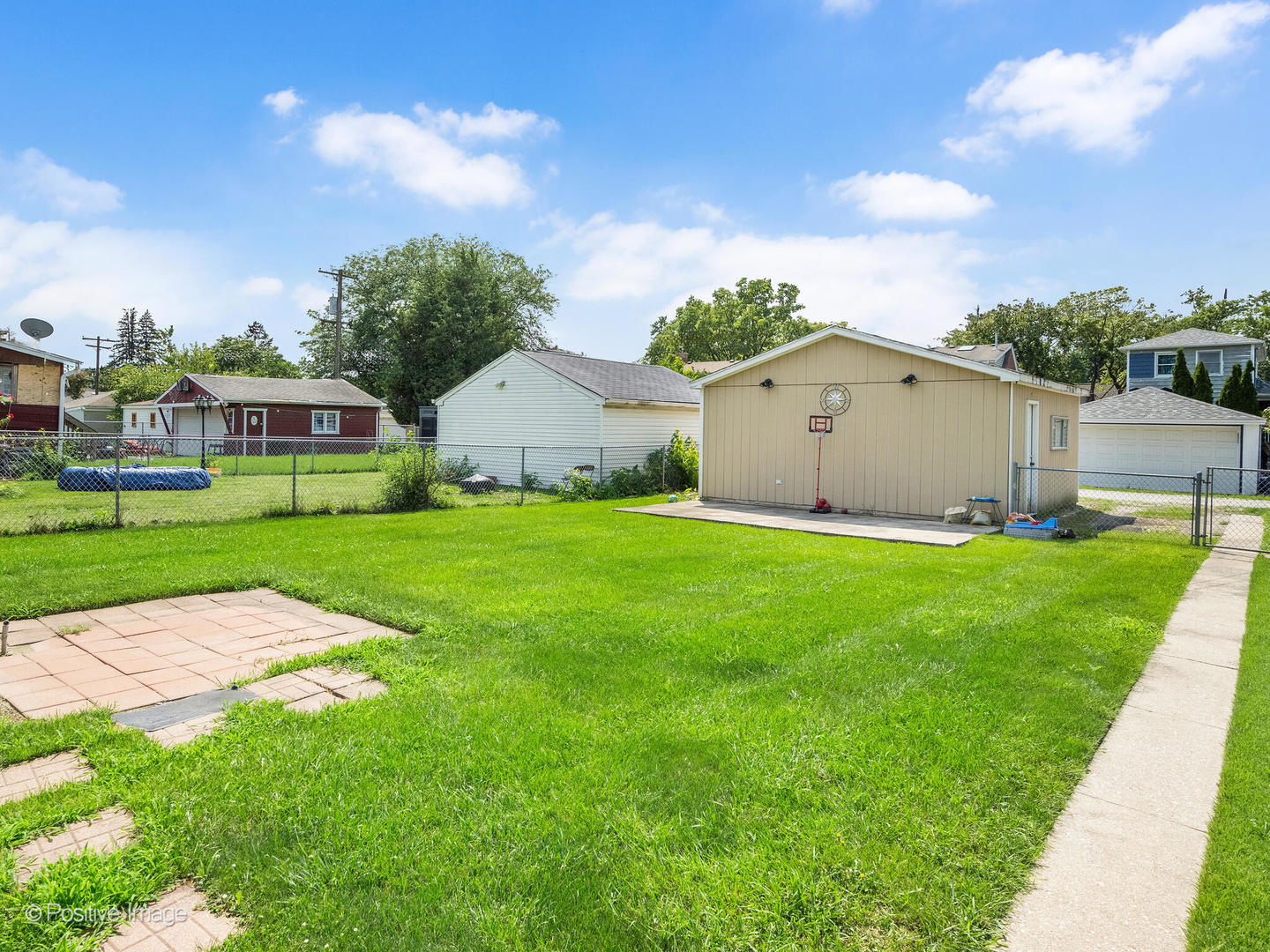 4214 Prairie Avenue Brookfield, IL 60513 - Photo 17 of 19 a view of a house with a big yard and large trees