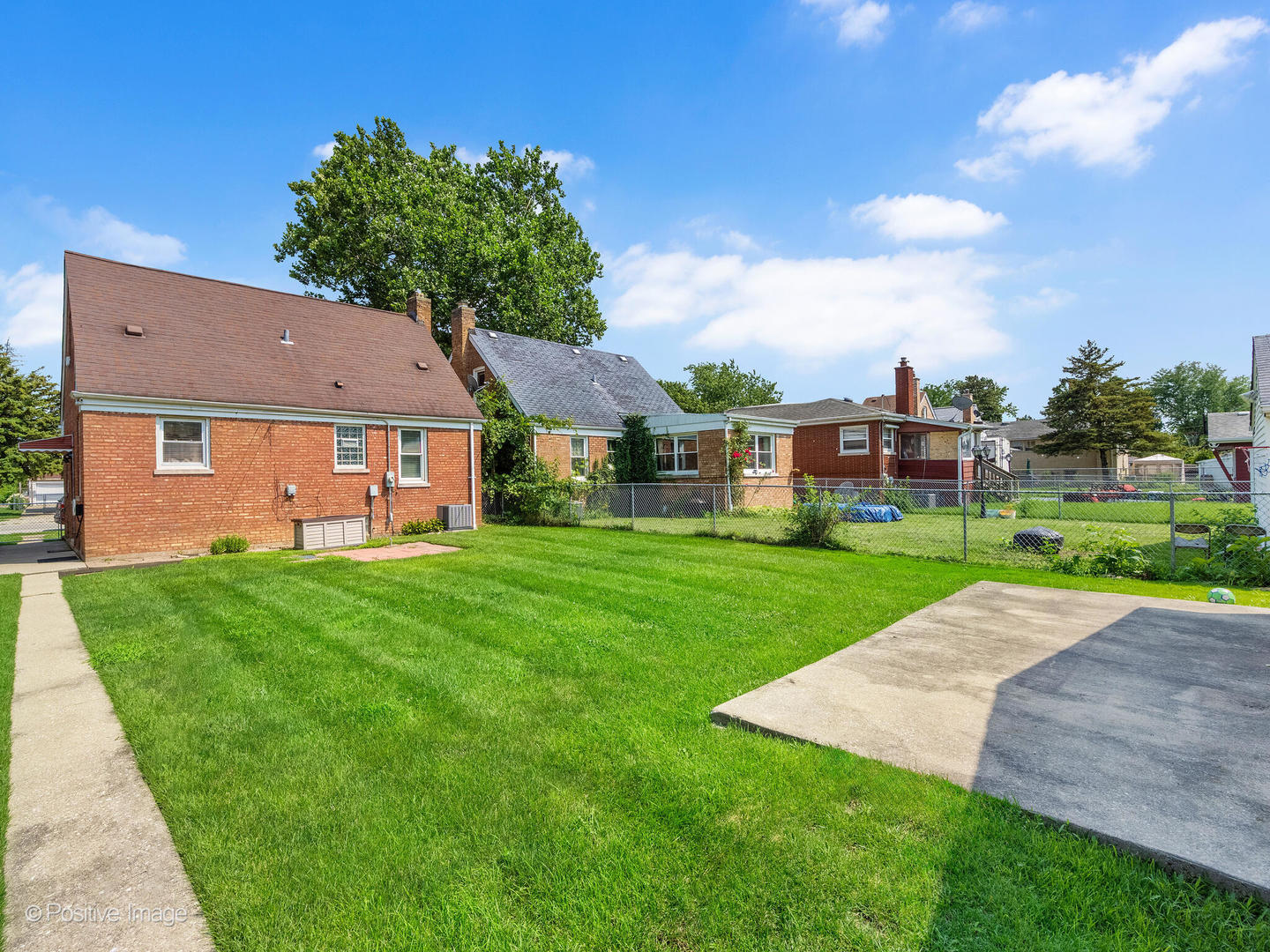 4214 Prairie Avenue Brookfield, IL 60513 - Photo 18 of 19 a view of a yard with a house in the background