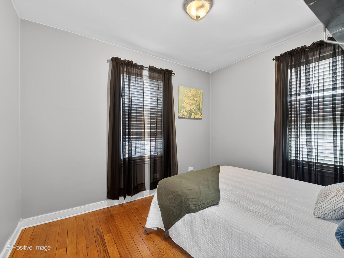 4214 Prairie Avenue Brookfield, IL 60513 - Photo 10 of 19 a bedroom with a bed and a window