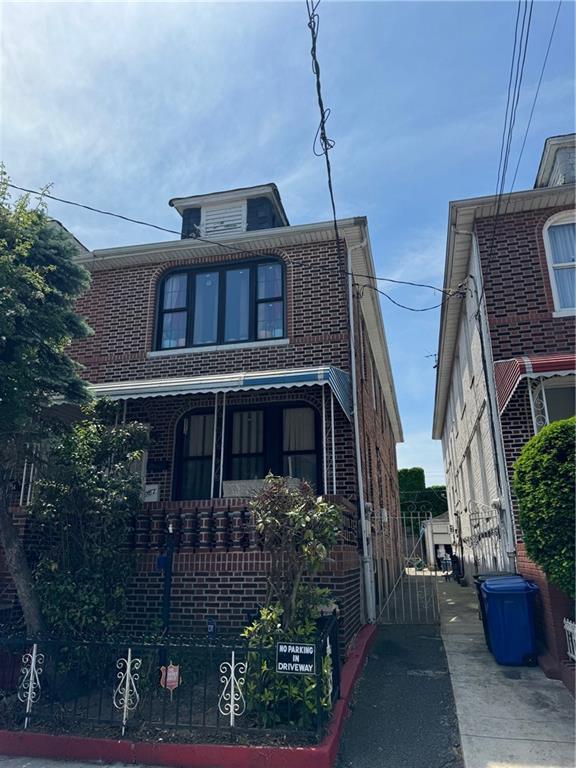 752 East 51st Street Brooklyn, NY 11203 - Photo 1 of 2 a front view of a house with garden