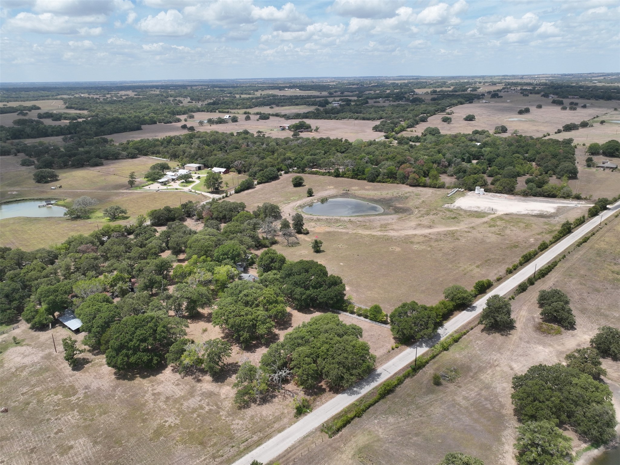 3775 Old Gay Hill Road Brenham, TX 77833 - Photo 12 of 13 an aerial view of a house with a yard