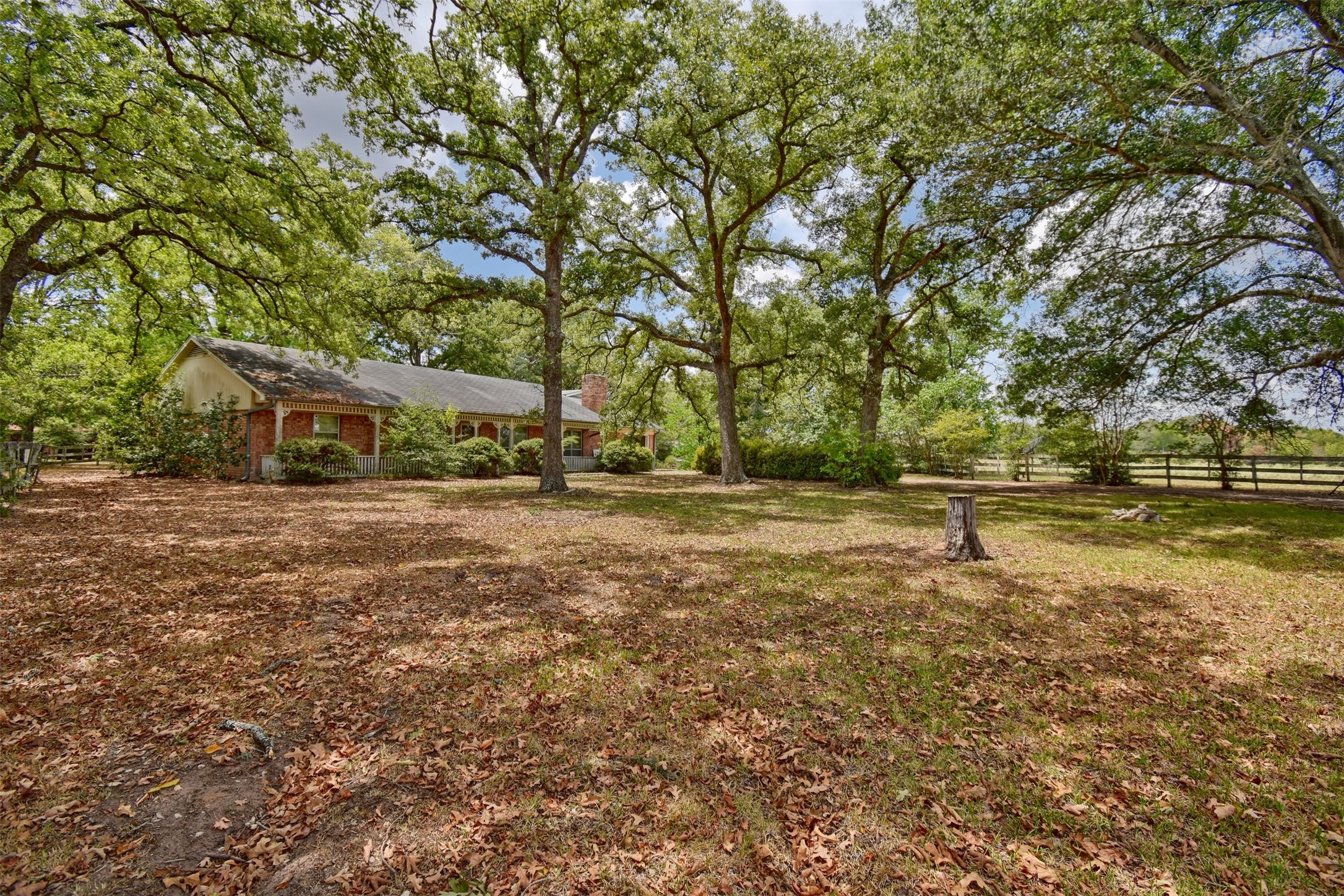 3775 Old Gay Hill Road Brenham, TX 77833 - Photo 2 of 13 a front view of a house with a yard