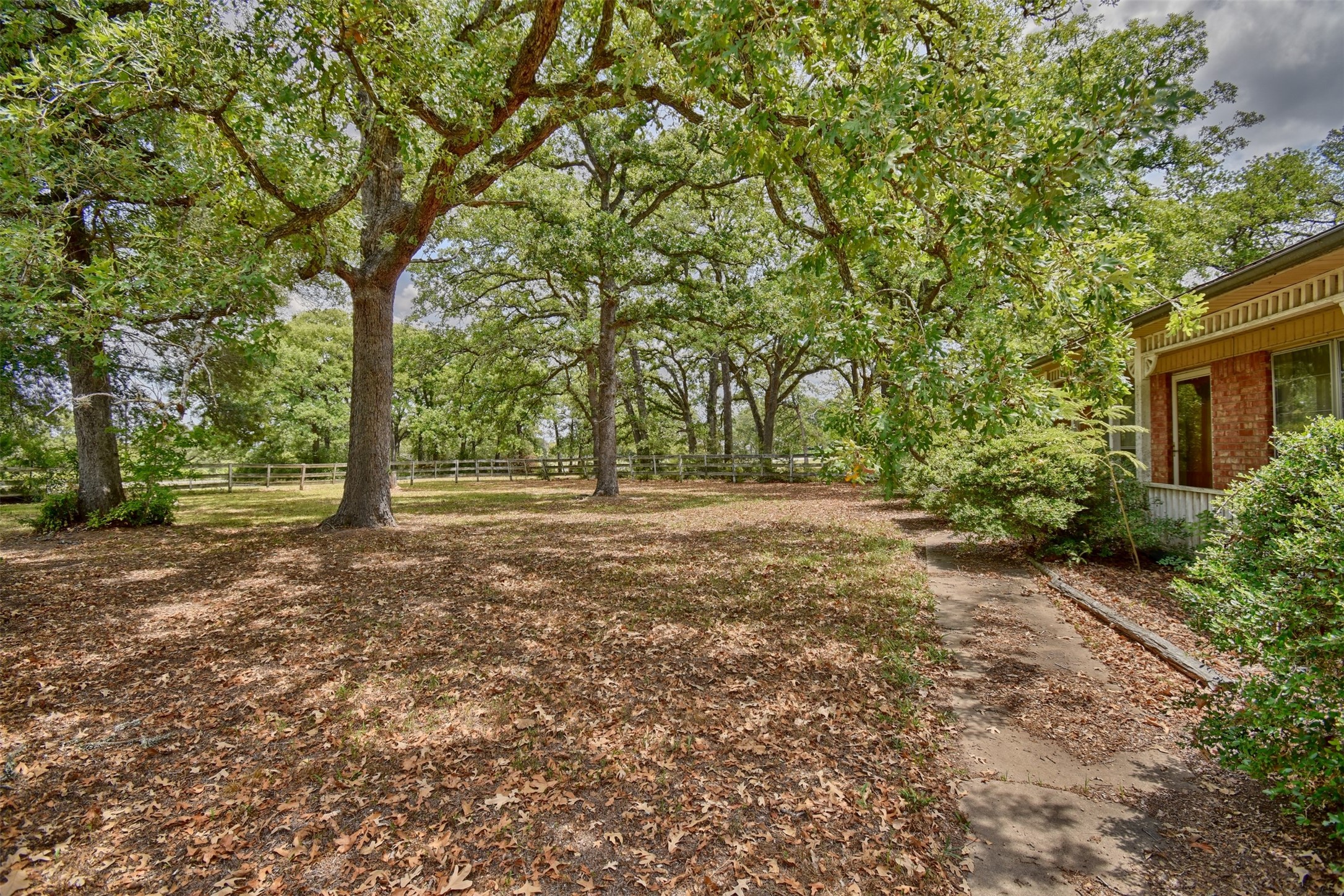 3775 Old Gay Hill Road Brenham, TX 77833 - Photo 5 of 13 a view of outdoor space with trees