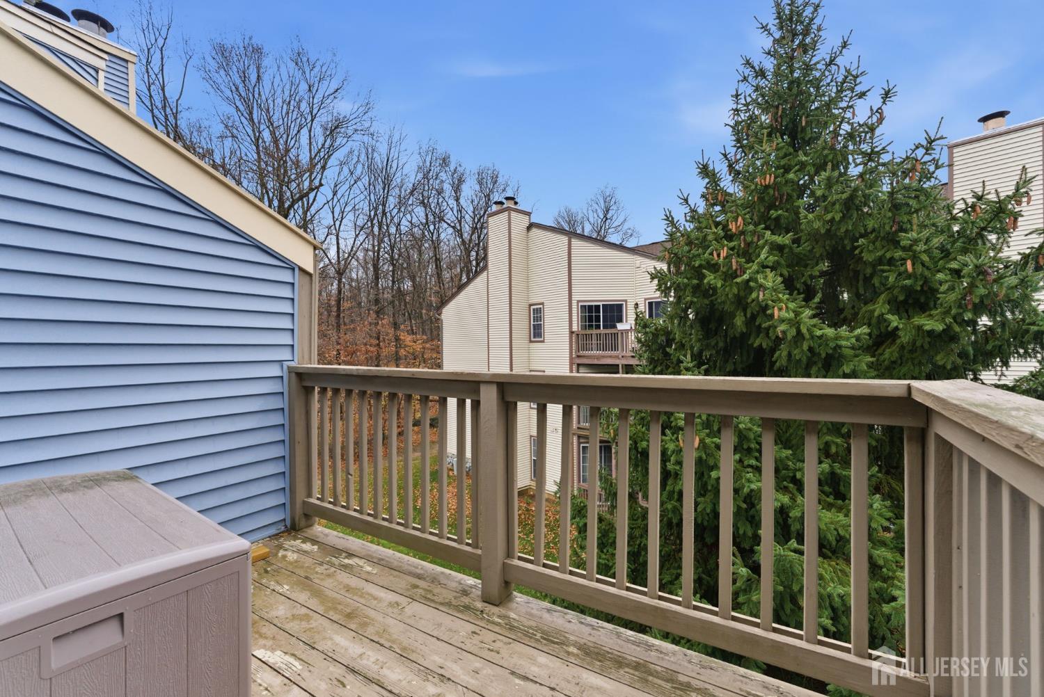 3242 Cypress Court Monmouth Junction, NJ 08852 - Photo 16 of 25 a balcony with wooden floor and fence