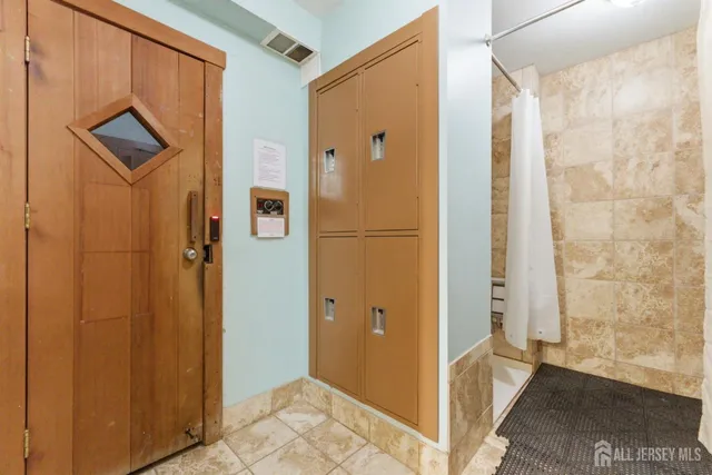 a view of a bathroom with shower