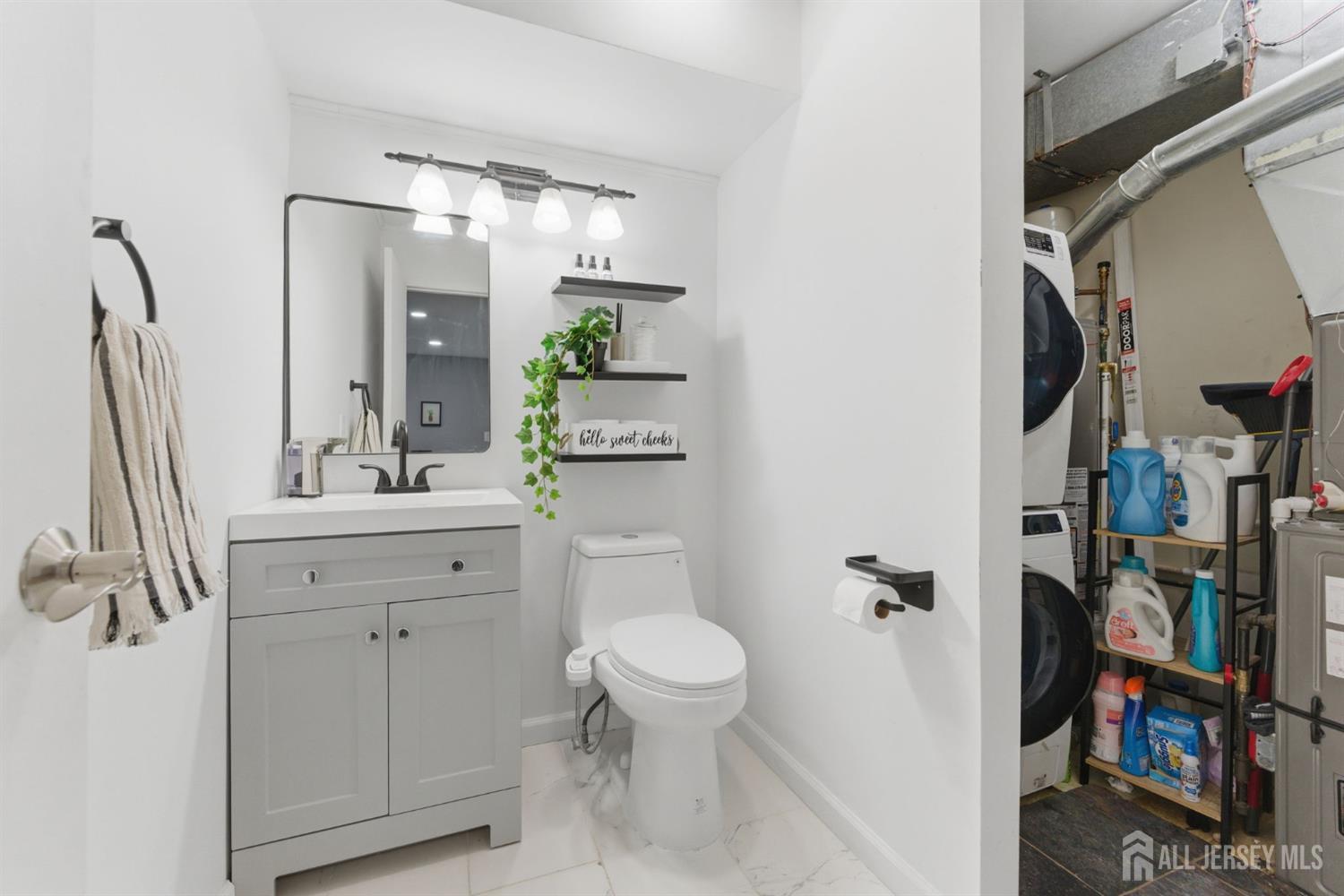 3242 Cypress Court Monmouth Junction, NJ 08852 - Photo 8 of 25 a bathroom with a sink a toilet and shower