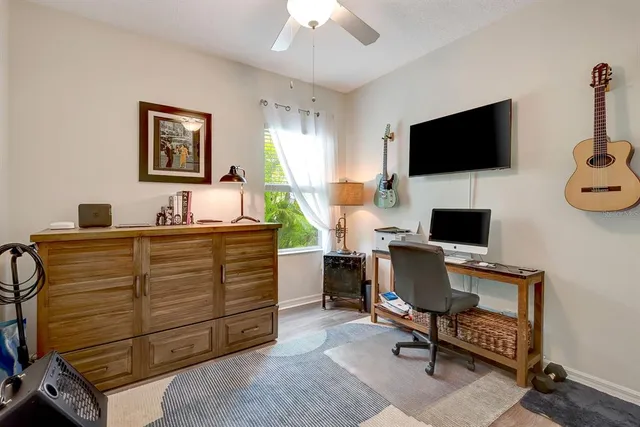 a view of entryway with a floor to ceiling window