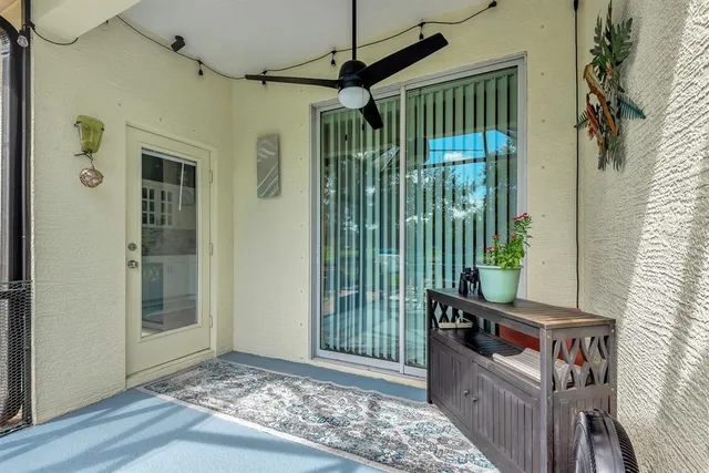 a view of an chairs and tables in the patio