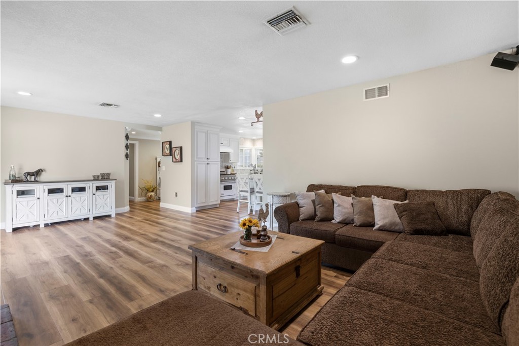 27816 Ridgegrove Drive Saugus, CA 91350 - Photo 28 of 65 a living room with furniture and wooden floor