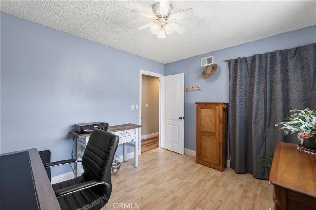 27816 Ridgegrove Drive Saugus, CA 91350 - Photo 34 of 65 a view of room with furniture and wooden floor