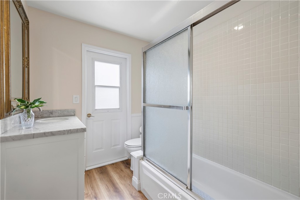 27816 Ridgegrove Drive Saugus, CA 91350 - Photo 35 of 65 a bathroom with a granite countertop sink toilet and shower
