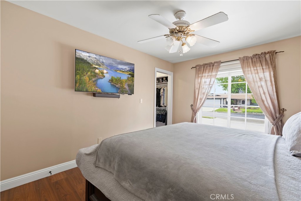 27816 Ridgegrove Drive Saugus, CA 91350 - Photo 40 of 65 a bedroom with a bed and a large window