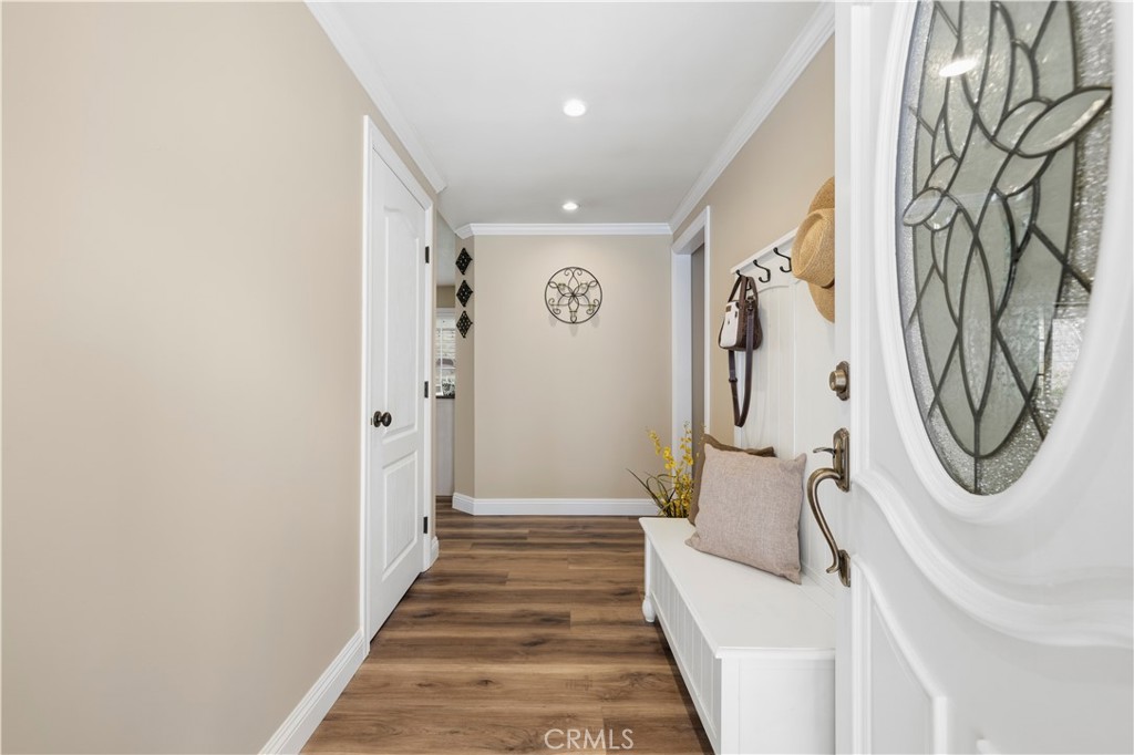 27816 Ridgegrove Drive Saugus, CA 91350 - Photo 6 of 65 a bathroom with a sink and mirror with bathtub