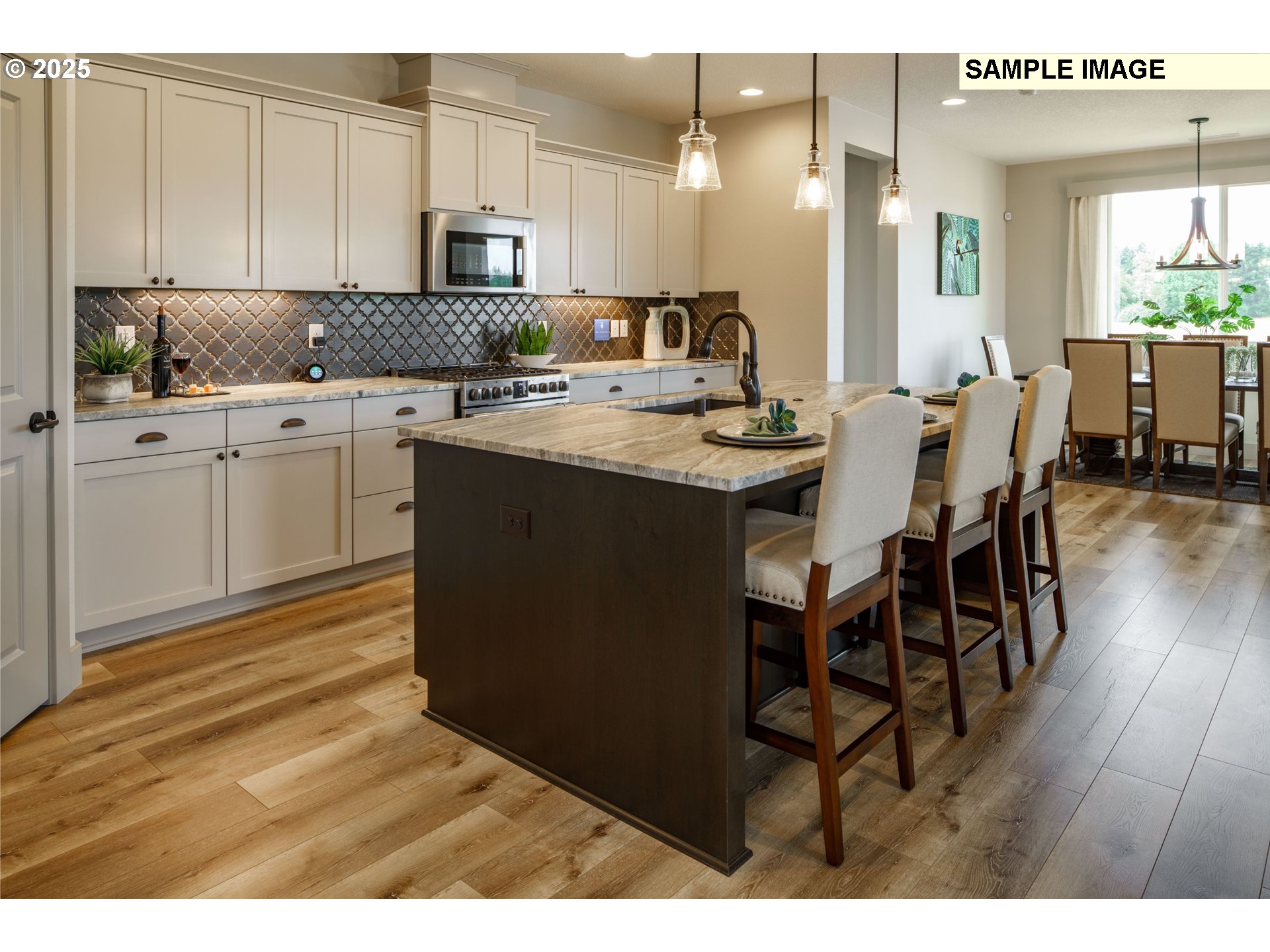 2064 South River Road Kelso, WA 98626 - Photo 4 of 18 a kitchen with kitchen island granite countertop a sink cabinets and wooden floor