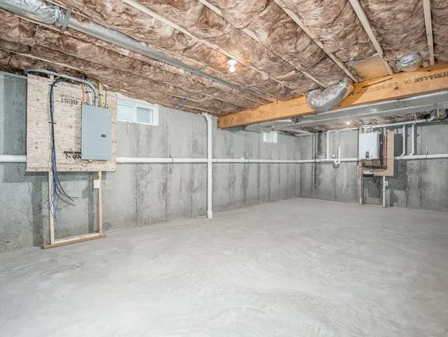 a view of a room with wooden shelves