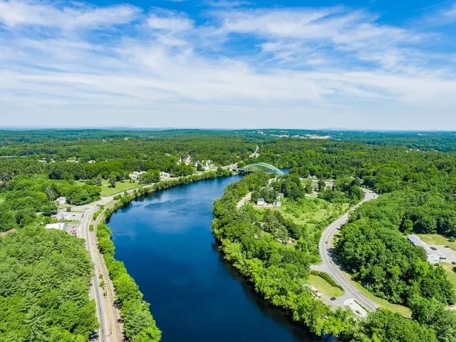 a view of a lake with a city
