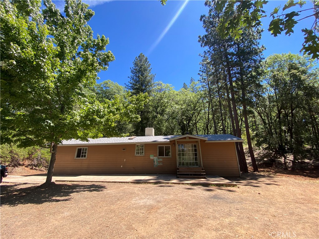 9462 Cohasset Road Chico, CA 95973 - Photo 1 of 1 a front view of house with trees around