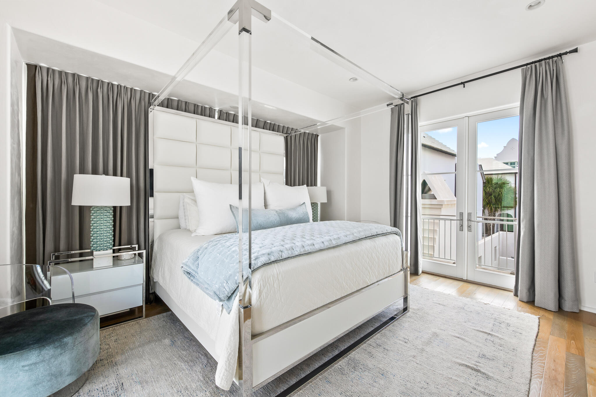 14 Shinbone Court Inlet Beach, FL 32461 - Photo 28 of 48 a bedroom with a large bed and a chandelier
