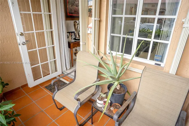 a view of a car park in front of a building