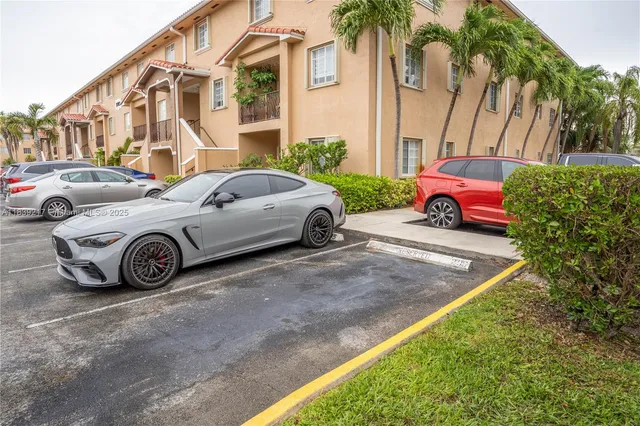 a view of a street with cars