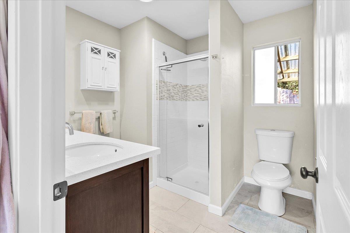 17780 Berta Canyon Road Prunedale, CA 93907 - Photo 11 of 19 a bathroom with a sink a toilet and shower