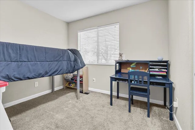 a area with furniture and a window