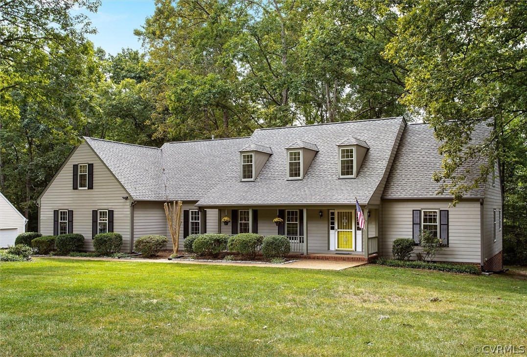 1006 Castle Hollow Road Midlothian, VA 23114 - Photo 1 of 42 a front view of a house with a garden