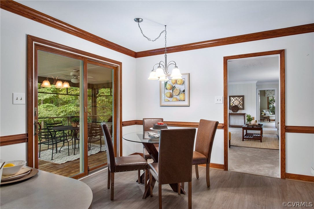 1006 Castle Hollow Road Midlothian, VA 23114 - Photo 15 of 42 a dining room with furniture and window