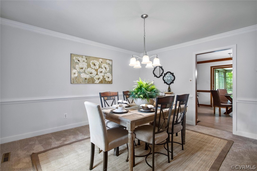 1006 Castle Hollow Road Midlothian, VA 23114 - Photo 18 of 42 a view of a dining room furniture and wooden floor