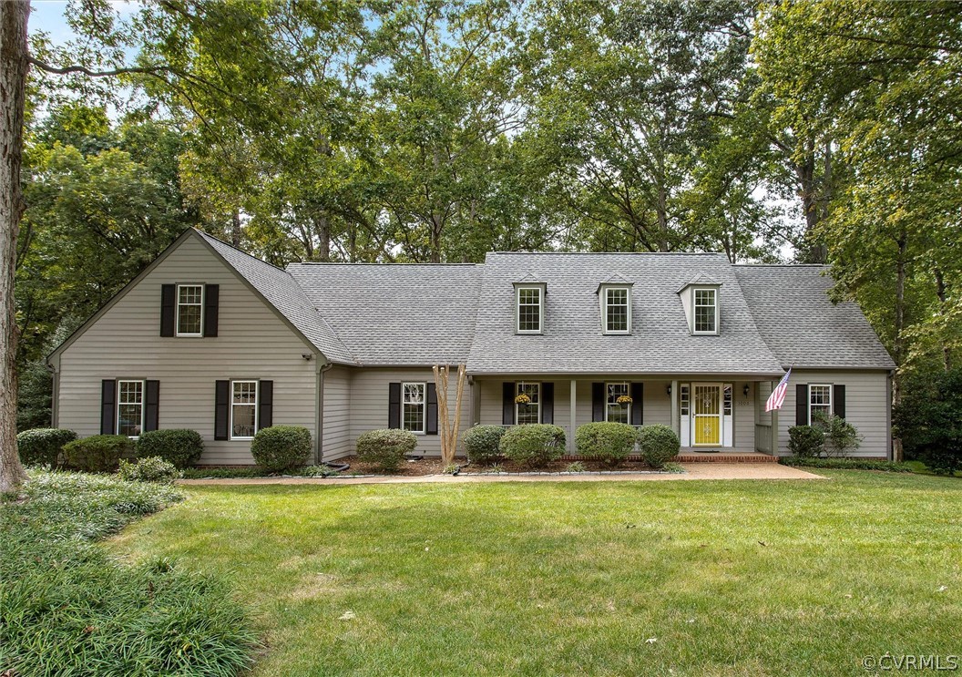 1006 Castle Hollow Road Midlothian, VA 23114 - Photo 2 of 42 a front view of a house with a garden