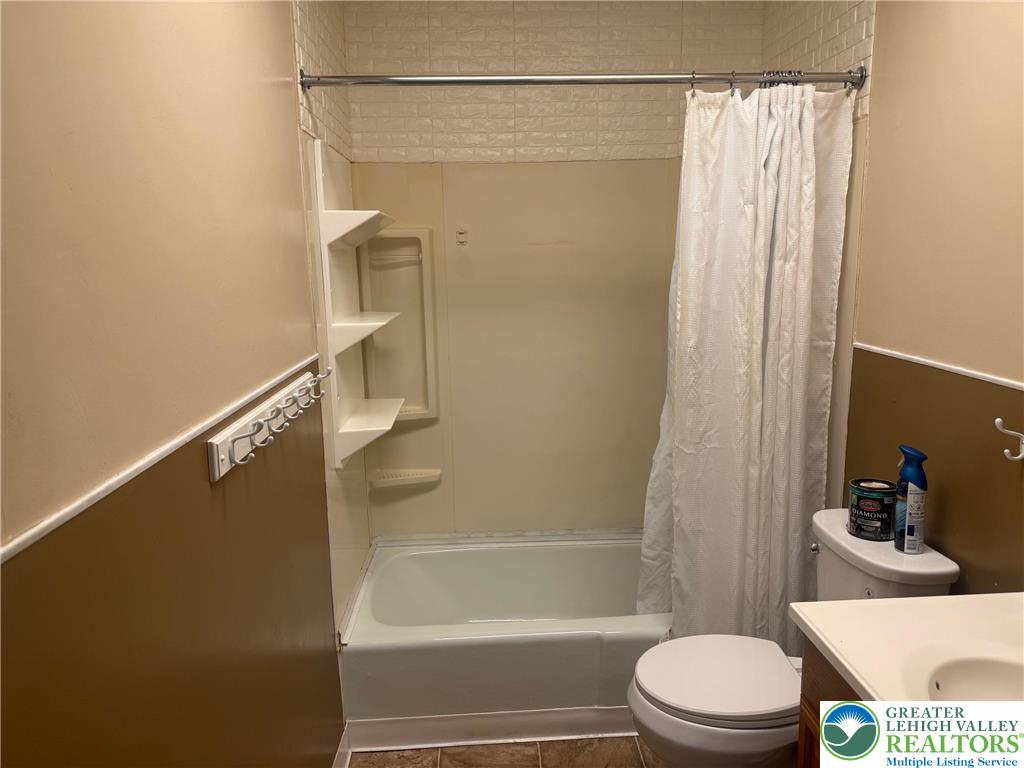 18 South 2nd, Unit B Easton, PA 18042 - Photo 6 of 8 a bathroom with a toilet and a shower