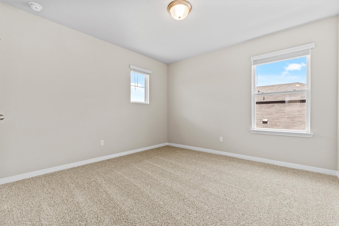 520 View Drive Georgetown, TX 78628 - Photo 19 of 23 an empty room with windows