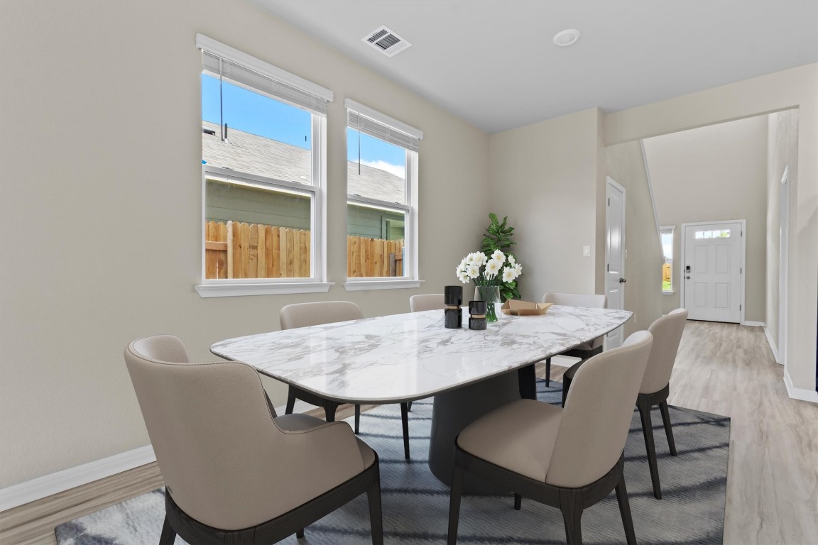 520 View Drive Georgetown, TX 78628 - Photo 5 of 23 a view of a dining room with furniture and window