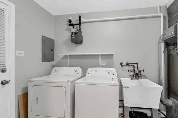 a utility room with dryer and washer