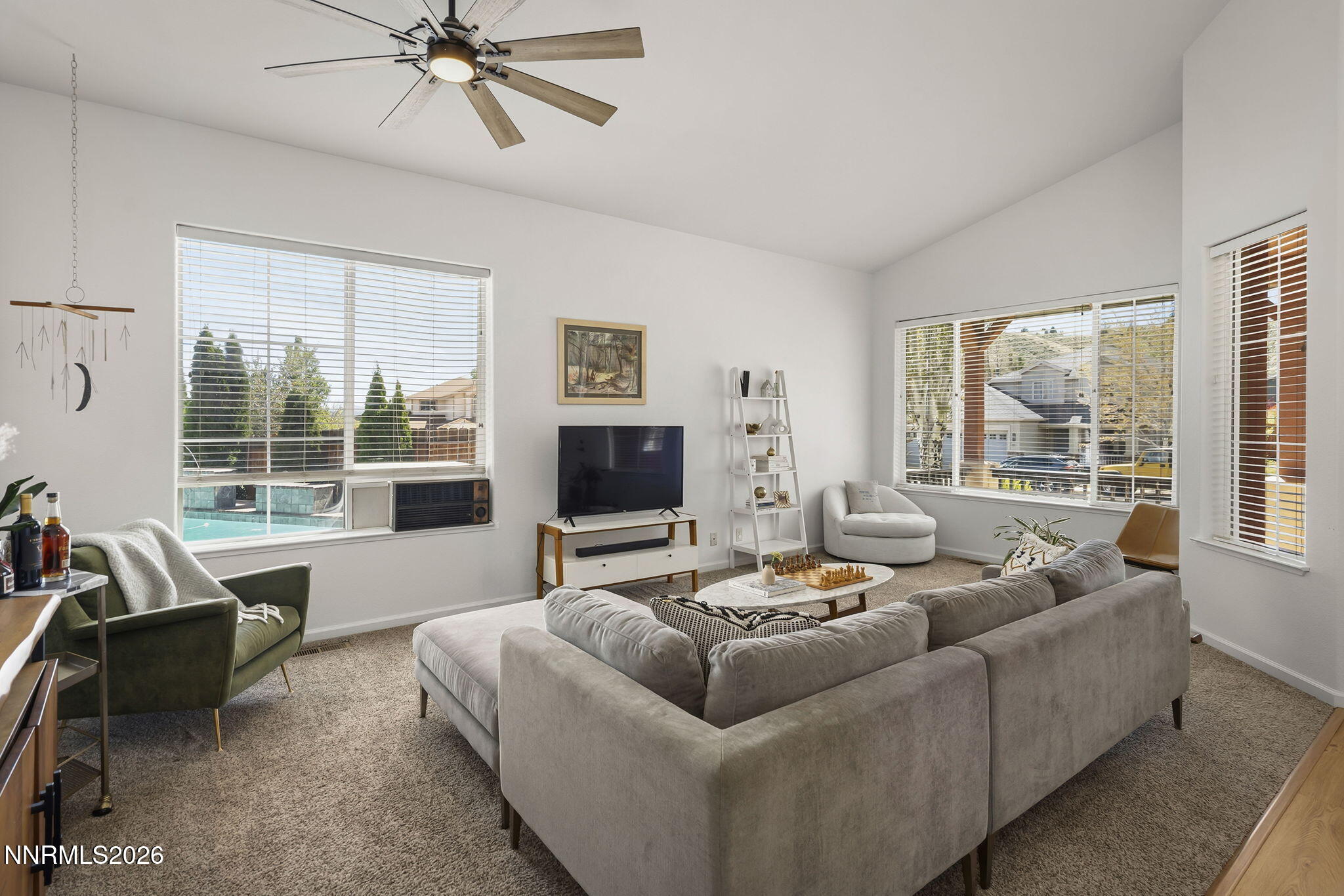 2900 Moose Ridge Drive Reno, NV 89523 - Photo 11 of 43 a living room with furniture and a flat screen tv