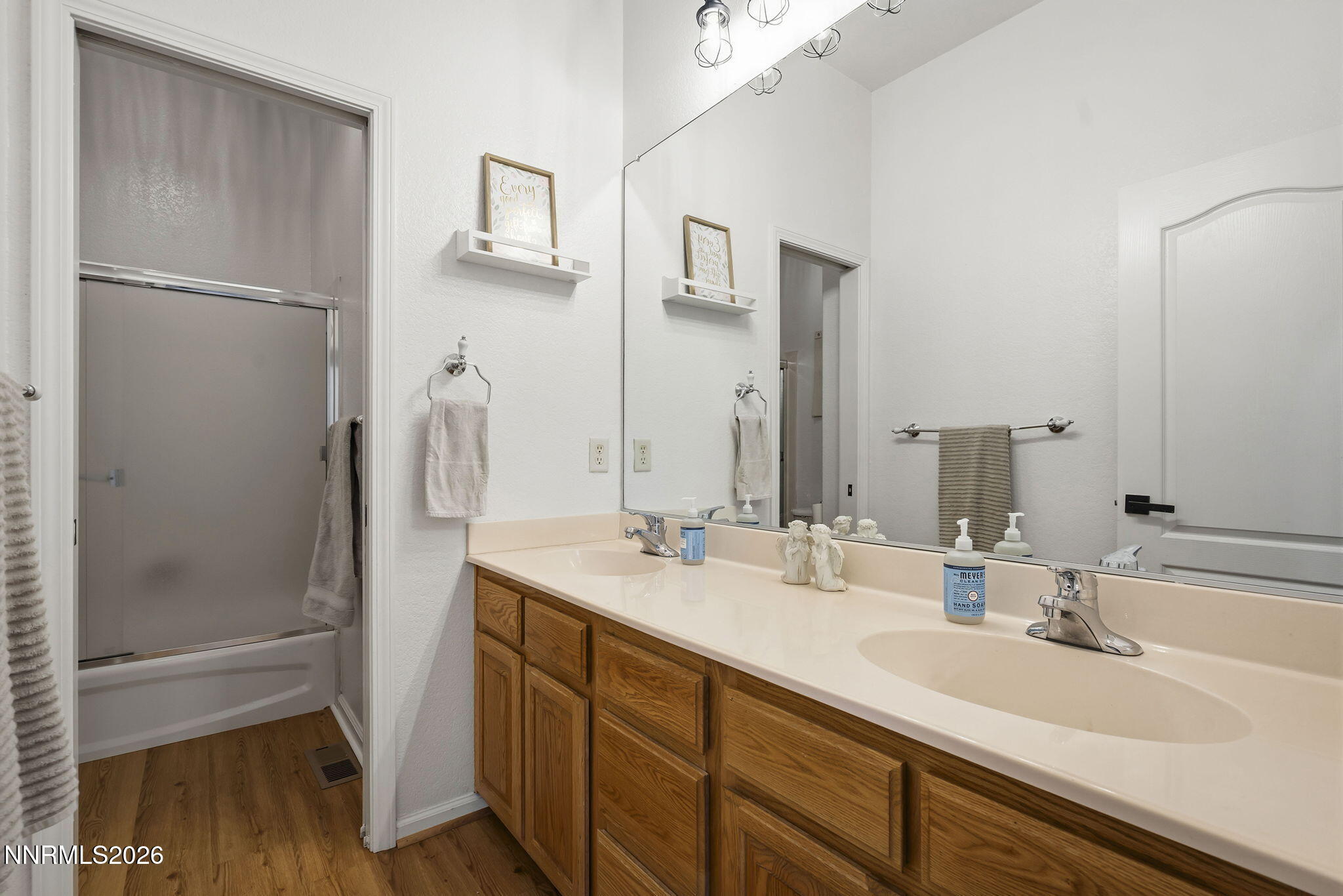 2900 Moose Ridge Drive Reno, NV 89523 - Photo 26 of 43 a bathroom with a double vanity sink mirror and double