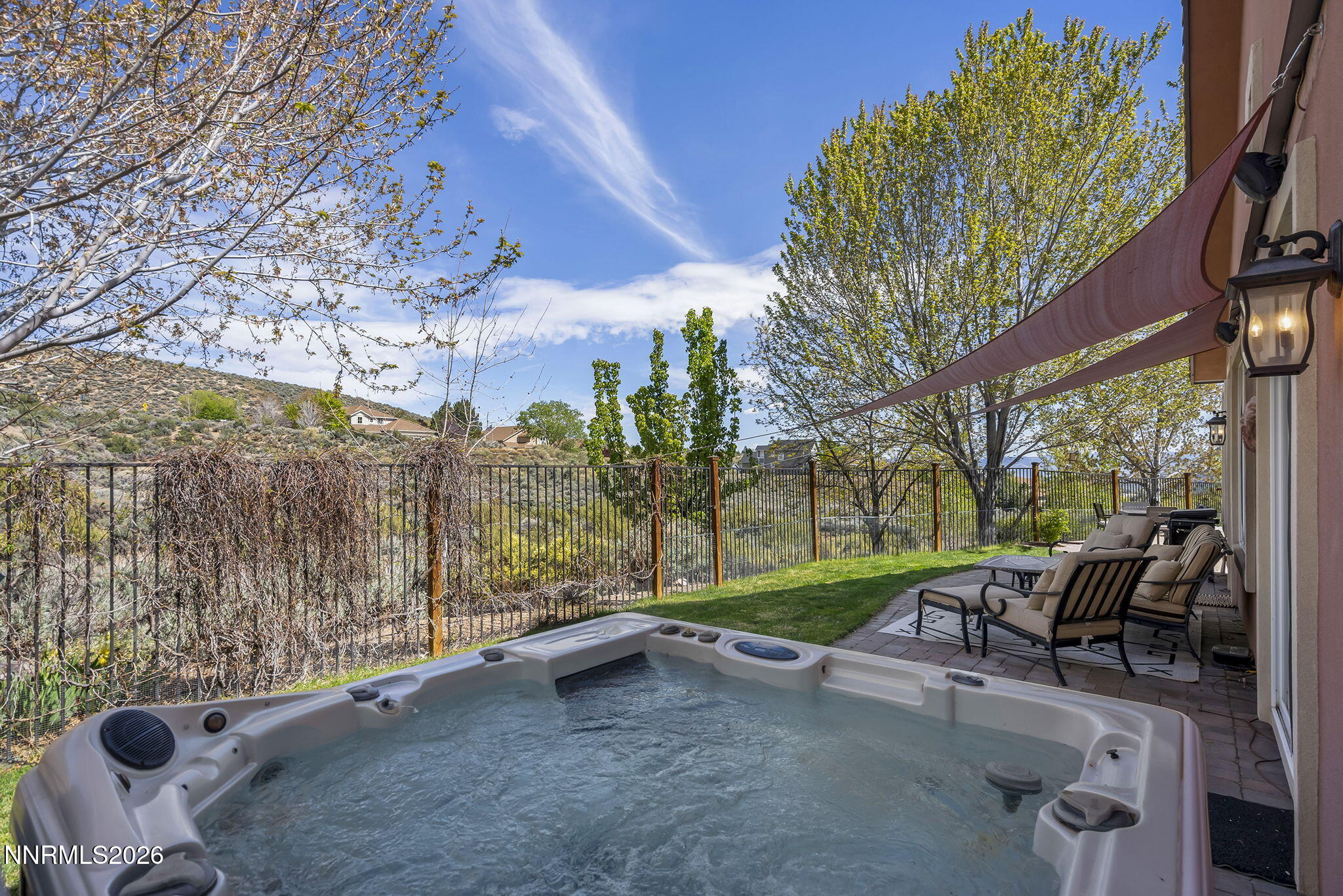 2900 Moose Ridge Drive Reno, NV 89523 - Photo 28 of 43 a view of backyard with swimming pool and outdoor seating