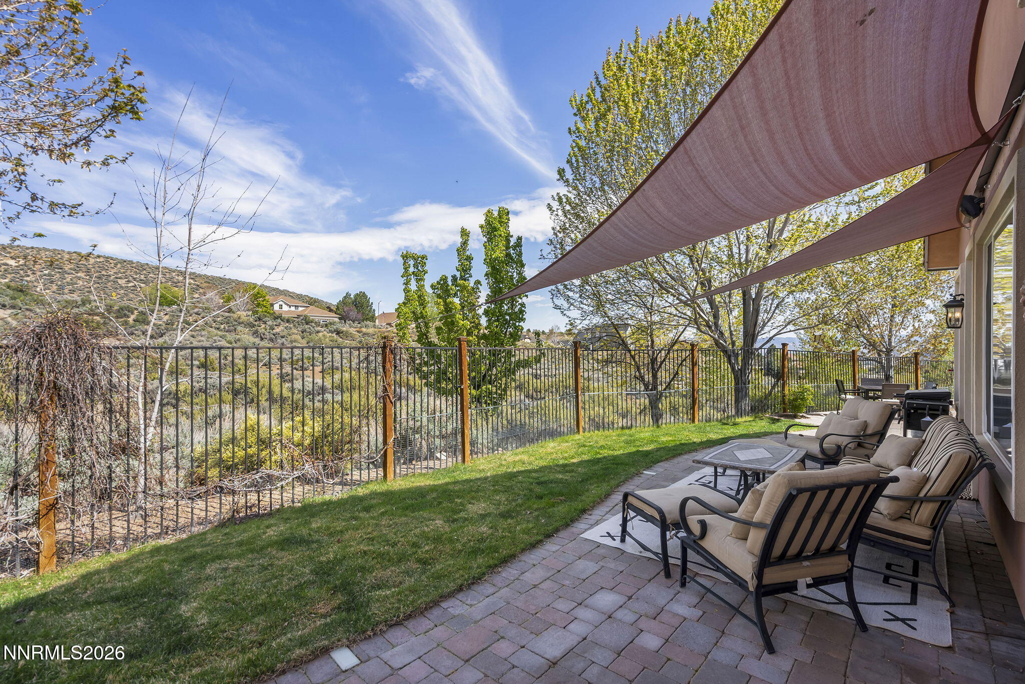 2900 Moose Ridge Drive Reno, NV 89523 - Photo 30 of 43 a view of a patio with table and chairs and potted plants