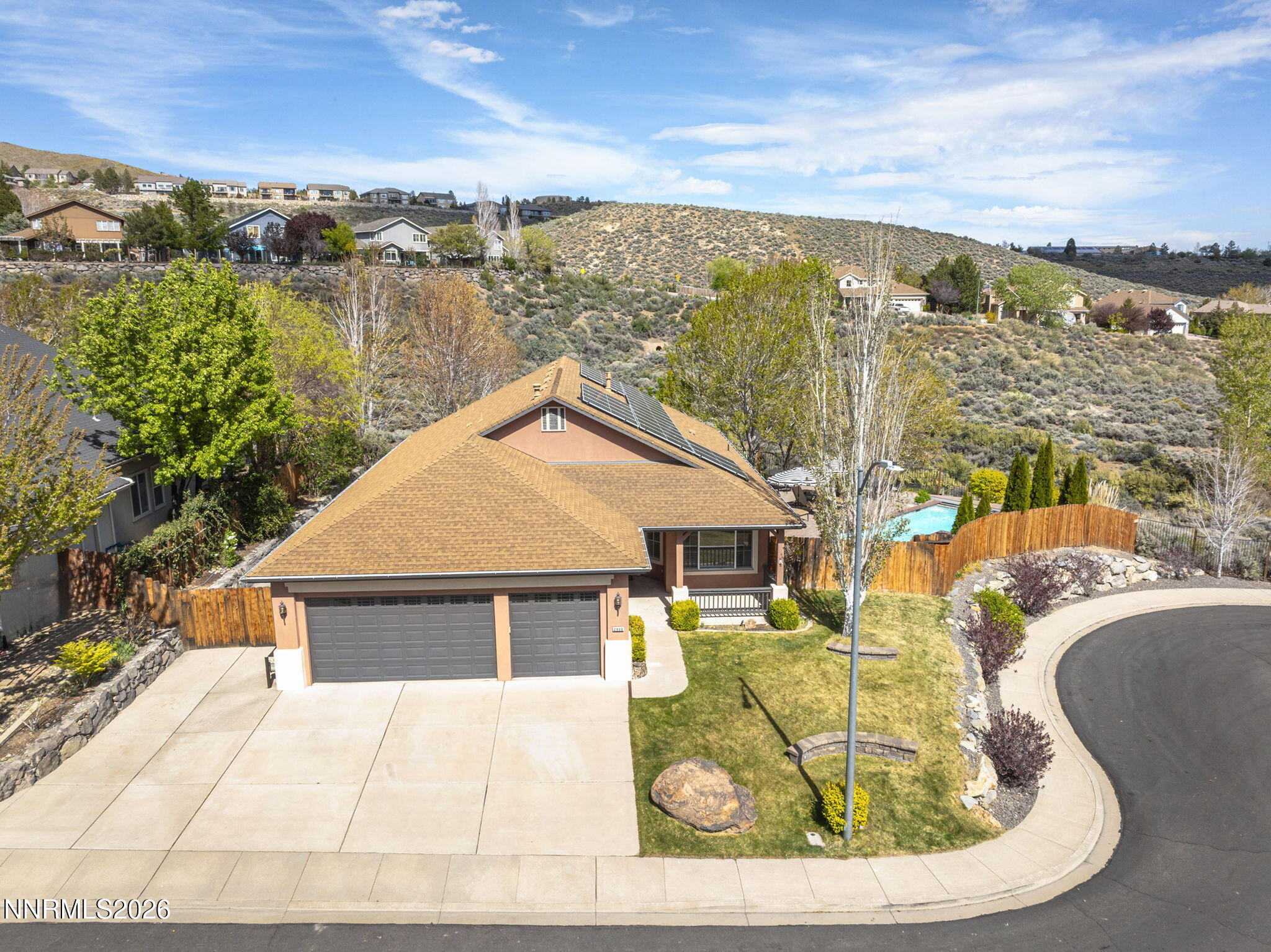 2900 Moose Ridge Drive Reno, NV 89523 - Photo 3 of 43 a view of a house with pool and chairs